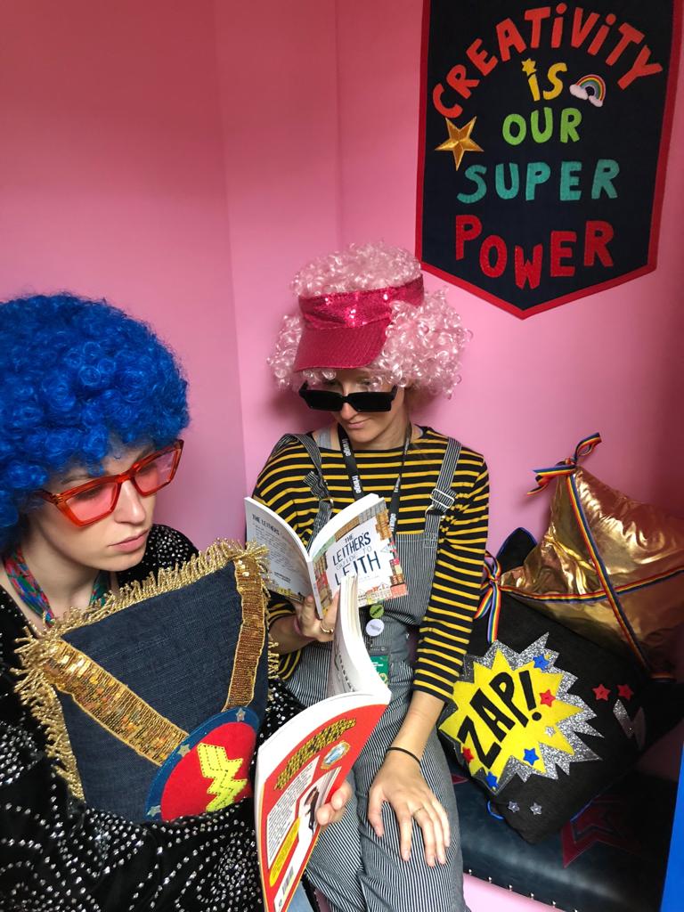Adults and children dressing up for Super Power Agency featured in how creative space can inspire children, SBID Education Council blog post by Maxine Sloss