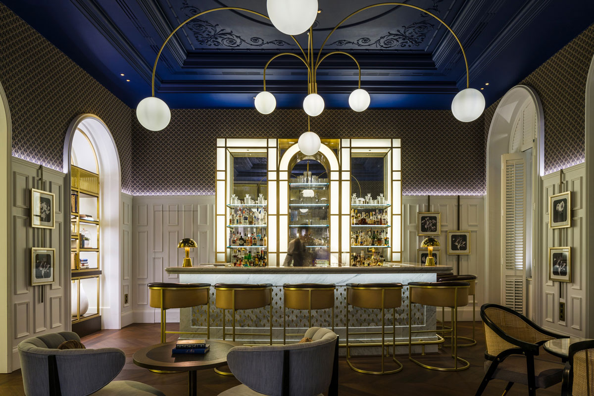 Hotel design by Goddard Littlefair featuring hotel bar area
