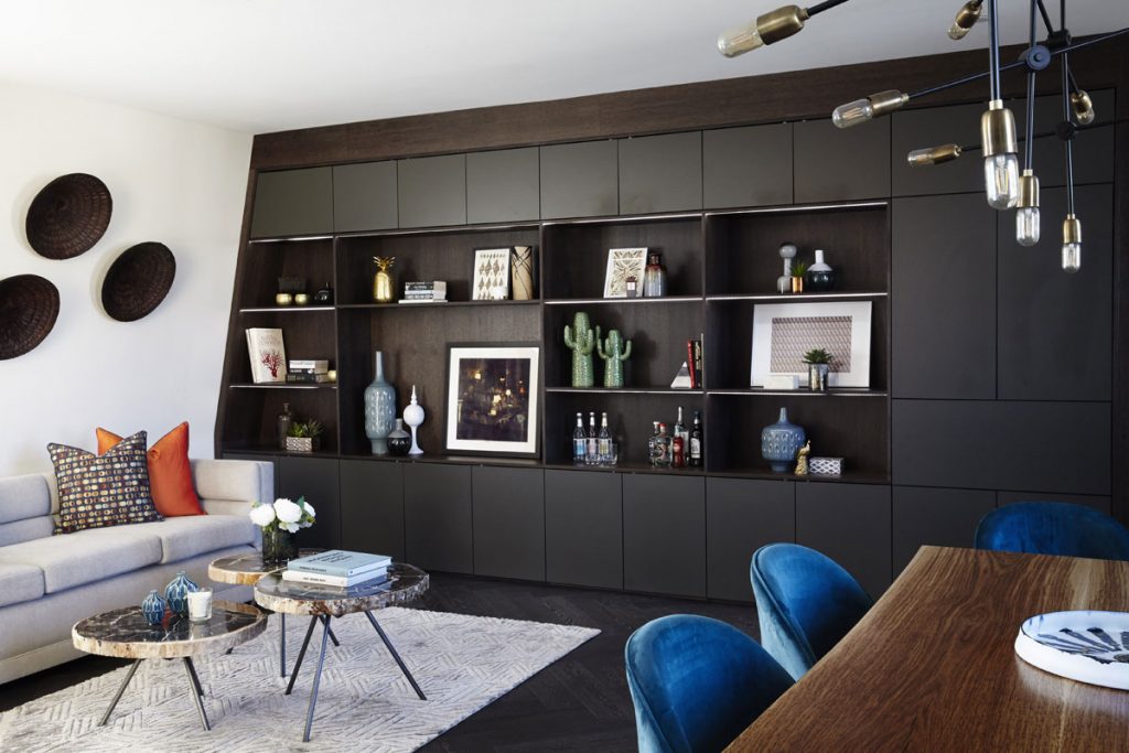 Contemporary interior design for living room with bespoke built-in shelving