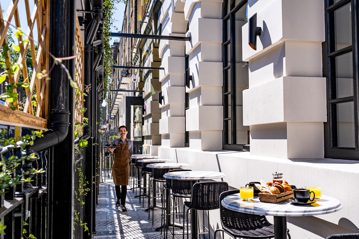 modern restaurant renovation, An 1880s Victorian Eatery Gets a Second Life After a Modern Renovation