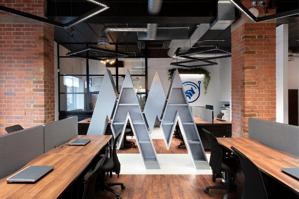 Renovated Small Office Design Allows for Future Company Expansion