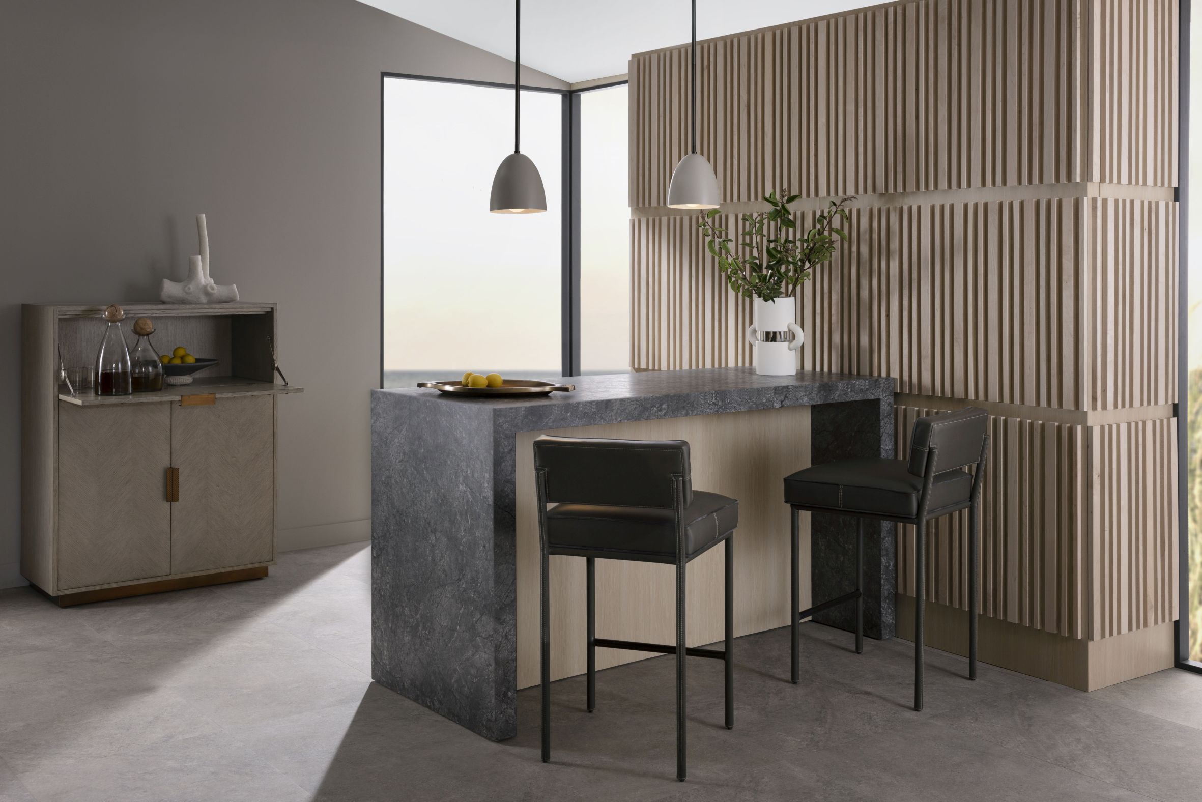 Arteriors, Upton Cocktail Cabinet, £8,390 and Topanga Counter stool £2,952